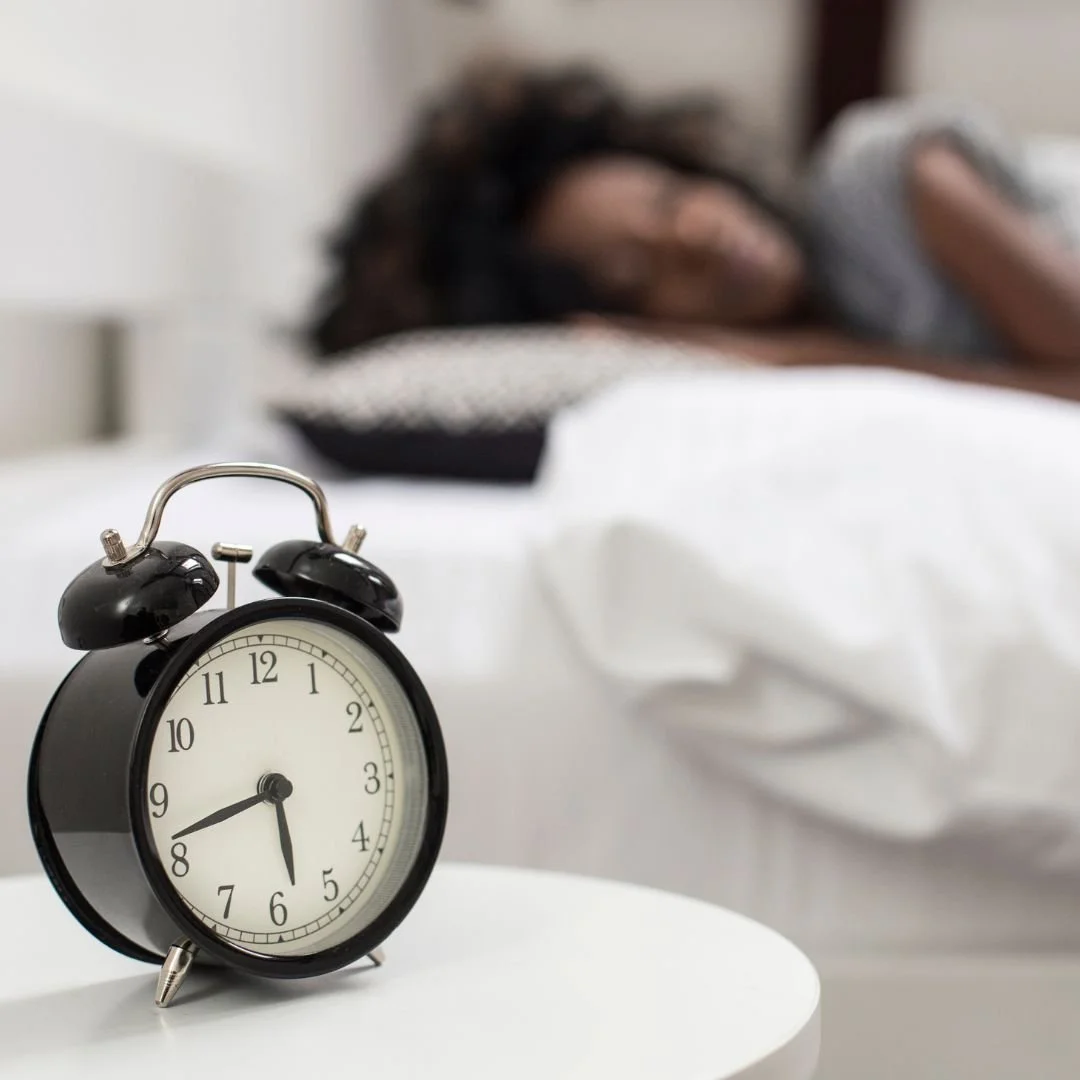 woman sleeping in bed after consuming cannabis